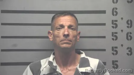 Mugshot of Joseph Raul Mills booked in Hopkins County, Kentucky on August 21, 2026