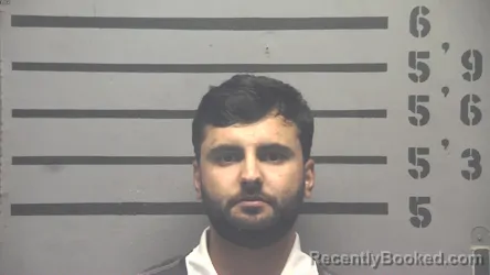 Mugshot of ABDURAUFI NAZARZODA booked in Hopkins County, Kentucky on June 22, 2026