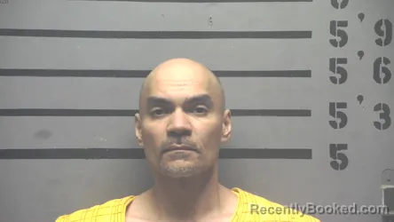 Mugshot of MICHAEL JUMO OLIVEROS