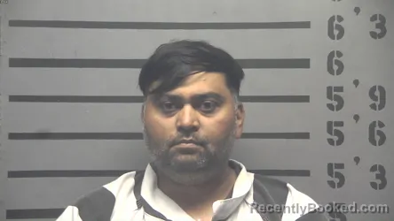 Mugshot of VISHALKUMAR PATEL booked in Hopkins County, Kentucky on June 23, 2026