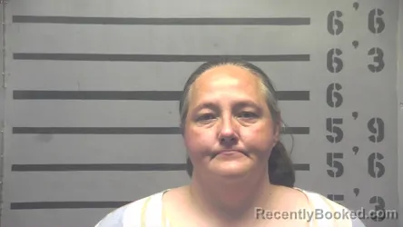 Mugshot of REBECCA PEARL RANDOLPH booked in Hopkins County, Kentucky on April 21, 2026