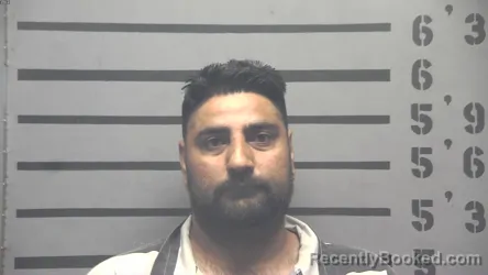 Mugshot of AJINDER SINGH booked in Hopkins County, Kentucky on June 17, 2026