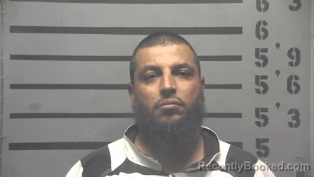 Mugshot of QAHTAN ADANA SHAHADA booked in Hopkins County, Kentucky on April 20, 2026