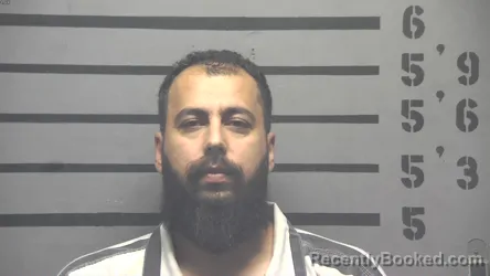 Mugshot of KASSEM TAHA booked in Hopkins County, Kentucky on April 27, 2026