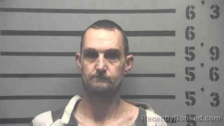 Mugshot of KENNETH DANIEL TANKSLEY booked in Hopkins County, Kentucky on July 14, 2026