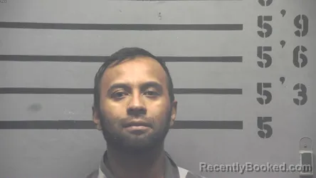 Mugshot of OSCAR OPEDED VELASQUEZ-FIGUEROA