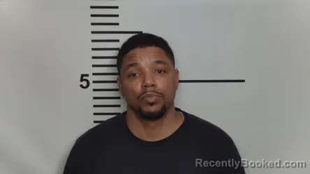 Mugshot of OSCAR H WOOLFOLK