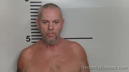 Mugshot of MANUEL E EMBRY