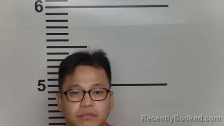 Mugshot of MICHAEL PADRE JU BURGOS