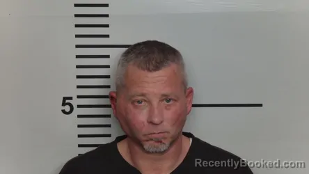 Mugshot of DONALD R COBLENTZ