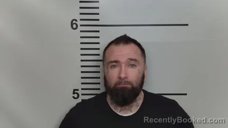 Mugshot of EARL T NEWHOUSE