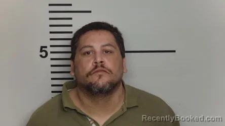 Mugshot of JAMES M HUGHES