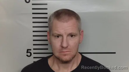 Mugshot of JOHN R TANNER