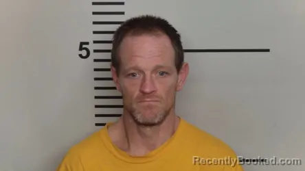 Mugshot of CHARLES W MILLS