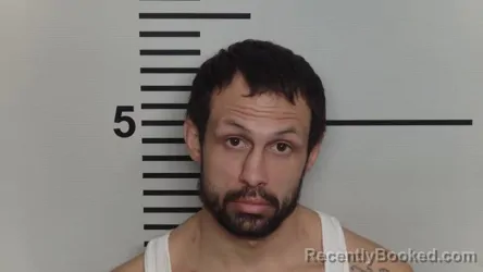 Mugshot of TRAVIS TRAY TUCKER