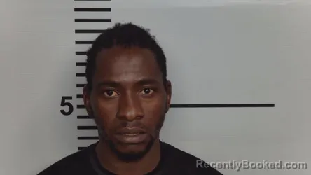 Mugshot of ALPHA BARJIBO booked in Jefferson County, Kentucky on March 6, 2026