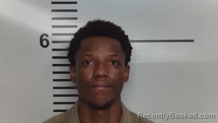 Mugshot of KABULU KAMUNGA booked in Jefferson County, Kentucky on March 6, 2026