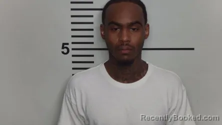 Mugshot of DOMINQUE LAWRENCE booked in Jefferson County, Kentucky on March 14, 2026