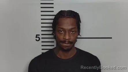 Mugshot of DEVON M BROWN booked in Jefferson County, Kentucky on March 14, 2026