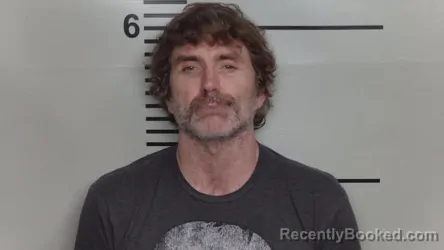 Mugshot of CHRISTOPHER OLOUGHLIN booked in Jefferson County, Kentucky on March 15, 2026