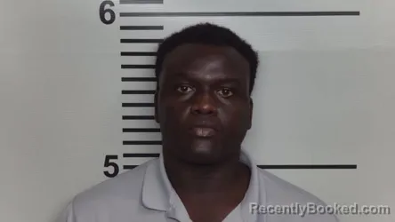 Mugshot of MOSES RADINTO MUGA booked in Jefferson County, Kentucky on March 16, 2026