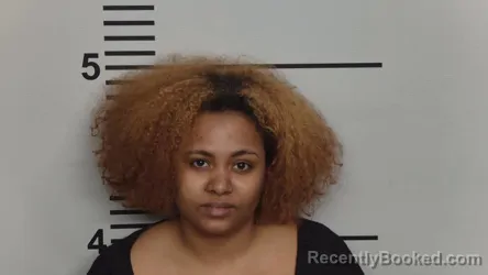 Mugshot of CALIYAH ELISE WOODS booked in Jefferson County, Kentucky on March 17, 2026