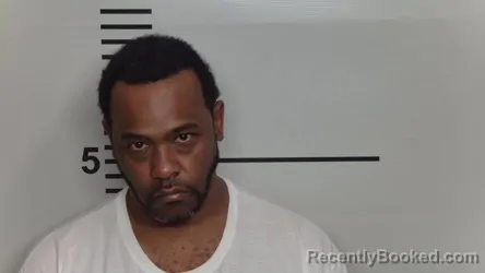 Mugshot of PENNEILL N WHITE booked in Jefferson County, Kentucky on March 18, 2026