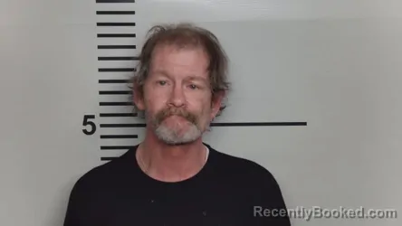 Mugshot of CHRISTOPHER WAYNE DAUGHERTY booked in Jefferson County, Kentucky on March 19, 2026