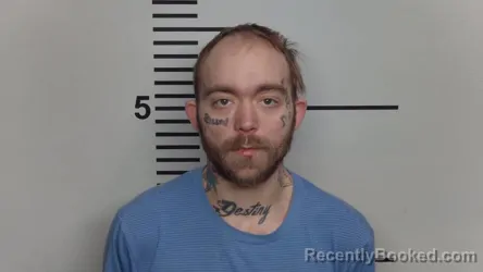 Mugshot of AUSTIN W BASKERVILLE booked in Jefferson County, Kentucky on March 21, 2026