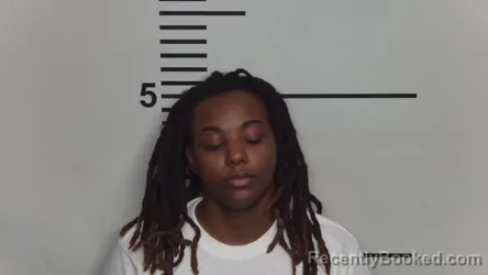 Mugshot of DALLAS UNIQUE BUTLER booked in Jefferson County, Kentucky on March 21, 2026