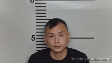 Mugshot of QI XI CHEN booked in Jefferson County, Kentucky on March 23, 2026