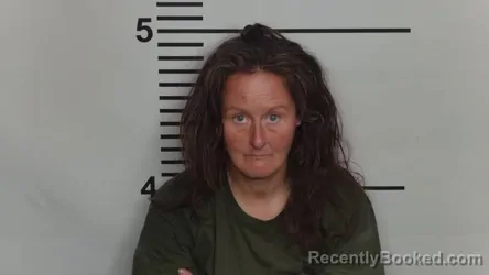 Mugshot of AMANDA K MOORE booked in Jefferson County, Kentucky on March 23, 2026