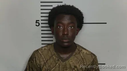 Mugshot of DEREK ASIEDU booked in Jefferson County, Kentucky on March 24, 2026