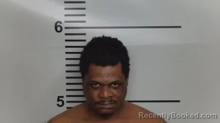 Mugshot of OMAR JAMES DEVONISH booked in Jefferson County, Kentucky on March 25, 2026