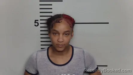 Mugshot of AMIRIKAL RENEE THOMAS booked in Jefferson County, Kentucky on March 25, 2026