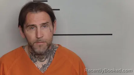 Mugshot of JACOB M BURNETT booked in Jefferson County, Kentucky on March 26, 2026