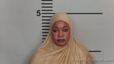 Mugshot of AICHA LEMRABET YOUMNE booked in Jefferson County, Kentucky on March 27, 2026