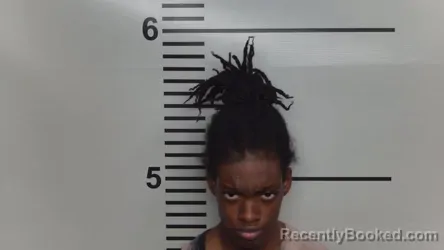 Mugshot of EVIONA SHAW booked in Jefferson County, Kentucky on March 27, 2026