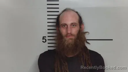 Mugshot of TRACY ALLAN STUTZMAN booked in Jefferson County, Kentucky on March 27, 2026