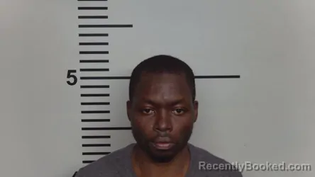 Mugshot of LEKEBA ASSOUMA booked in Jefferson County, Kentucky on March 29, 2026