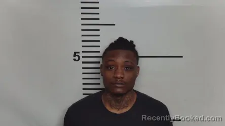 Mugshot of MIYKEL IRVINE booked in Jefferson County, Kentucky on March 31, 2026