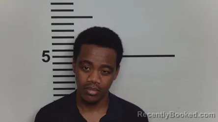 Mugshot of DANIEL SADIKI RUGWIRO booked in Jefferson County, Kentucky on April 15, 2026