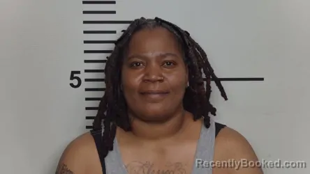 Mugshot of LAKESHA SHARON DOUGLAS booked in Jefferson County, Kentucky on April 16, 2026