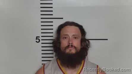 Mugshot of MANOLIN A SANTIAGO booked in Jefferson County, Kentucky on April 25, 2026