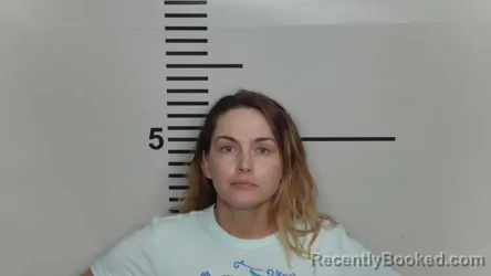 Mugshot of SARAH BURDEN booked in Jefferson County, Kentucky on May 18, 2026