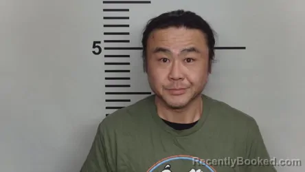 Mugshot of CHANG HYUN SHIN booked in Jefferson County, Kentucky on May 18, 2026
