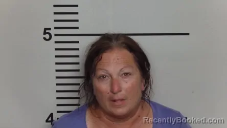 Mugshot of TINA LOUISE CALHOUN booked in Jefferson County, Kentucky on May 20, 2026
