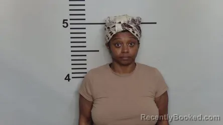 Mugshot of AISHA RENATA CLAY booked in Jefferson County, Kentucky on May 24, 2026