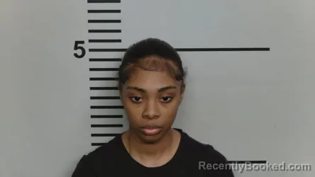 Mugshot of EEANISHA JOHNSON booked in Jefferson County, Kentucky on May 27, 2026