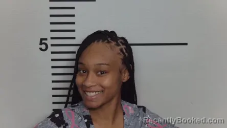 Mugshot of DE'ZAMA RUTH LEE ADAMS booked in Jefferson County, Kentucky on June 2, 2026